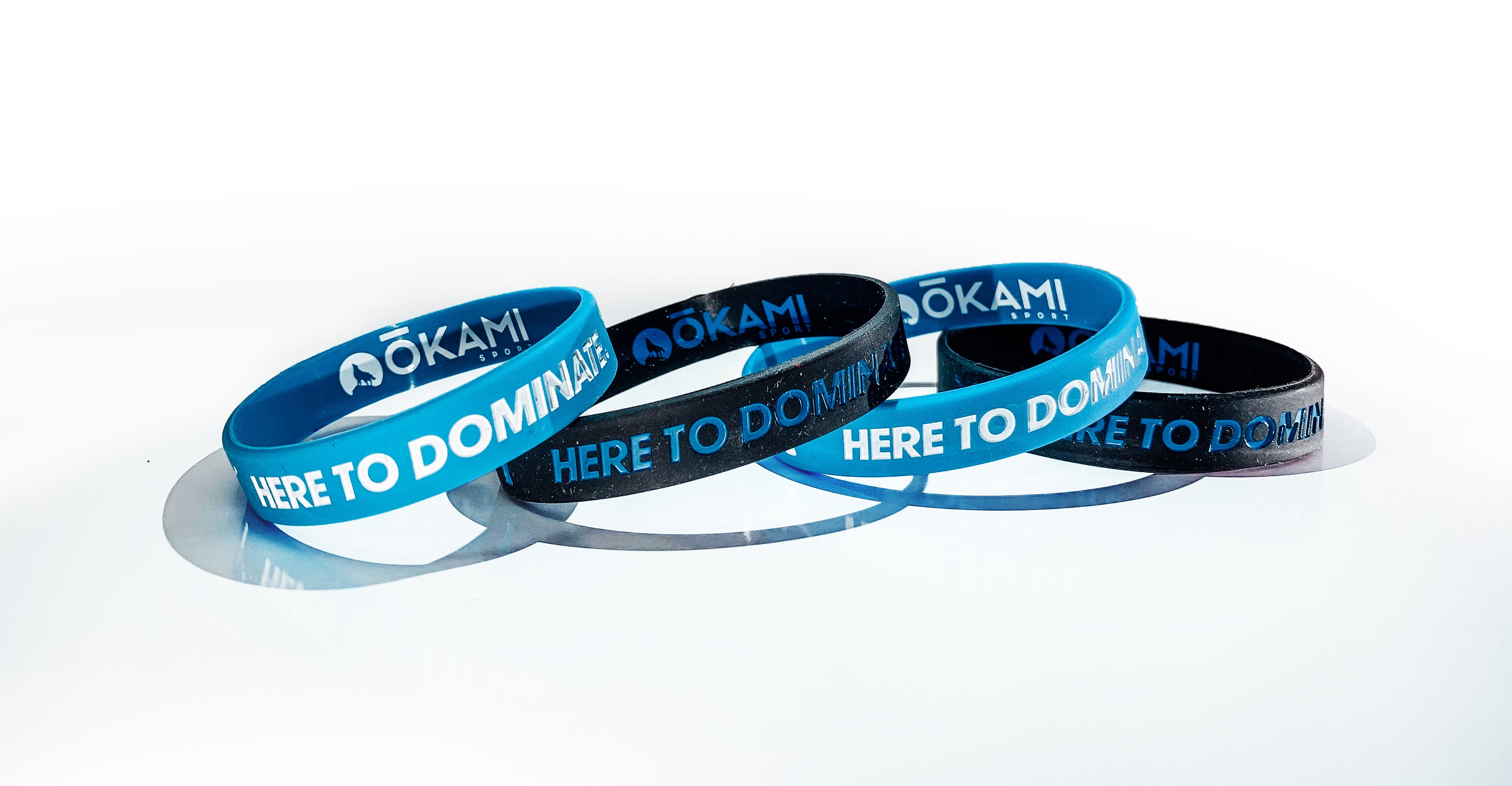 Black / Here To Dominate wristband (included in this 4 pack)